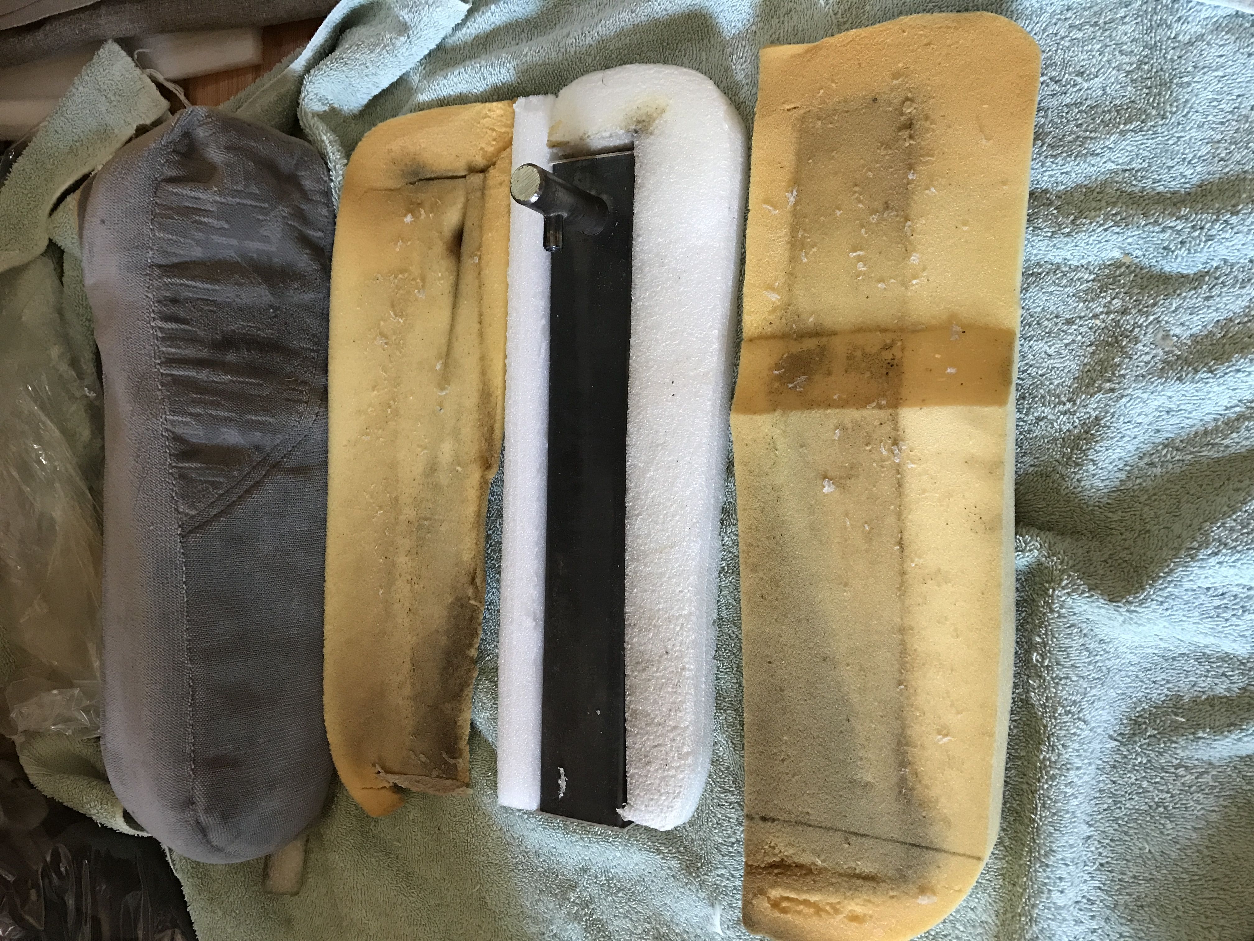 Armrest pieces and behind is covered one.